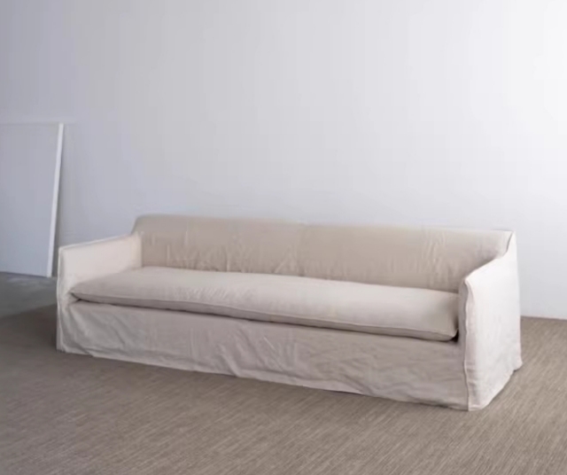 Sala de estar de sofá de tecido macio